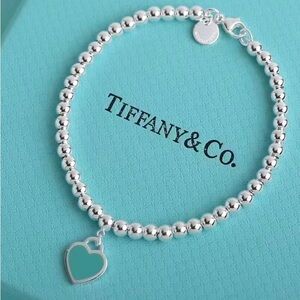 Tiffany & Co. Silver Bracelet with Blue Heart Charm
